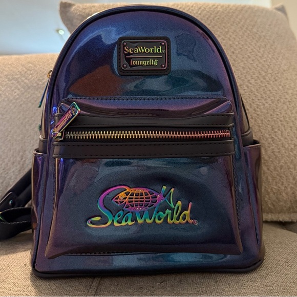Loungefly SeaWorld Iridescent Purple Backpack - Picture 4 of 13